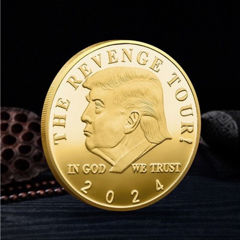2 Donald trump coins - one gold colored and one silver colored